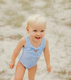 Girls' Powder Blue Sustainable Stripe Bow Swimsuit (Baby, Toddler) 12 Girls' Powder Blue Sustainable Stripe Bow Swimsuit (Baby, Toddler) -TYR Sales 7217023582376 blue 3a